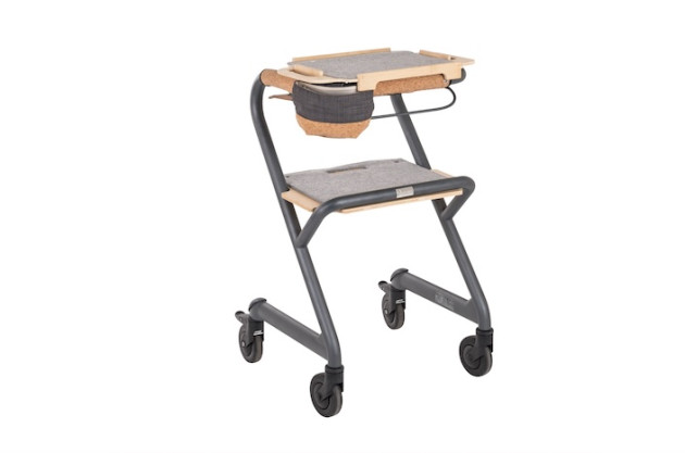 Indoor rollator with tray seat and bag