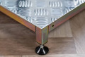 Adjustable metal half step 