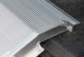van ramp resting on van 