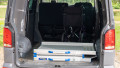 Folding feal anyramp folded up in the boot of a car