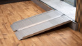 economy folding ramp resting on step
