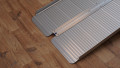 base of the folding wheelchair ramp