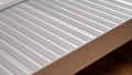 economy folding ramp resting on step, close up of surface
