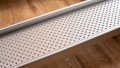 Close up of the surface of low Profile Edge Channel Ramps resting on a step used for a wheelchair or mobility scooter