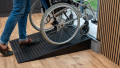 wheelchair in use on rubber threshold ramps