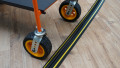 1 channel black and yellow cable protector with trolley going over the top of it