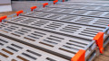 Close up of grip surface on a step of a portable rollable aluminium wheelchair ramp