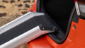 Telescopic dog ramp resting on the boot of a car, close up of the rest on connection