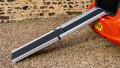 Telescopic dog ramp resting on the boot of a car