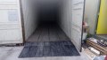 Ground level shipping container ramp providing access into a container 