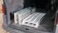 extra wide motorbike loading ramps folded up and stored in boot