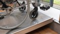 wheelchair ramp with wheelchair being loaded