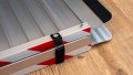 Extra wide folding wheelchair ramp folded up for storage - close up of the safety strap