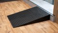 Rubber ramps by door threshold 