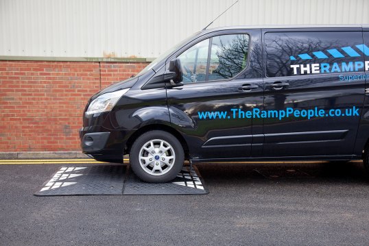 The Ramp People pass over the speed cushion