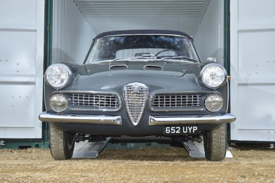 Classic car on loading ramps 