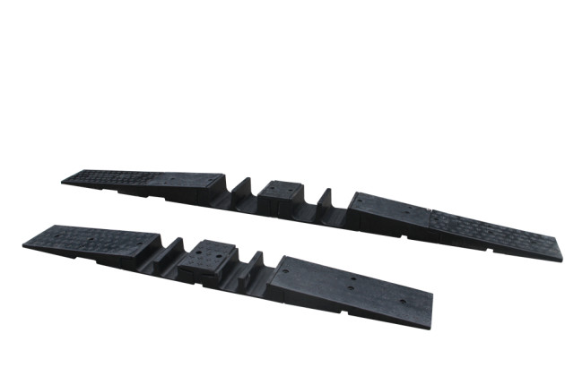 two sets of rubber modular hose protectors with two channels on a white background, one is 100mm high and the other is 150mm high