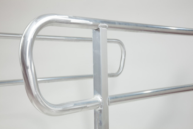 Handrail for wheelchair ramp