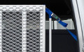 Van ramp with safety straps 
