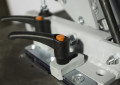 Quick release system for folding van ramps