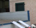 Aluminium channel ramps resting on tipper truck 