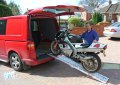 Loading motorcycle in to the back of a van 