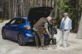Lightweight rollator being lifted into car boot 