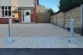 Telescopic bolllards in use outside home on driveway 