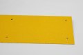 Yellow non-slip stair tread with grit coating