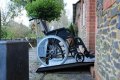 Wheelchair going up wheelchair ramp 