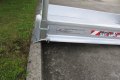 Portable wheelchair ramp with handrails 