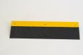 Black and yellow anti-slip stair tread and nosing