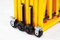 Expandable barrier wheels and brake 