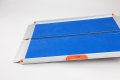 Blue grip surface on premium folding wheelchair ramp 