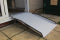 adjustable threshold ramp with entry plate 