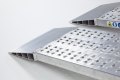 aluminium car ramps resting on ground