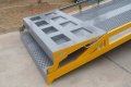 Folding hinged base of the yard ramp 
