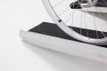 Manual wheelchair going up ramp 