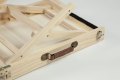 Close up of the carry handle on the adjustable wooden dog ramp 