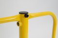 Close up up the yellow folding bollard 