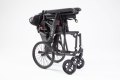 Folded transit wheelchair 