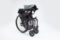 Folded wheelchair Rehasense Icon 35 self propelled wheelchair 