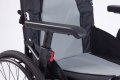 Adjustable armrests on the self propelled wheelchair 