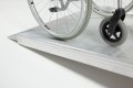Wheelchair ramp grip surface 