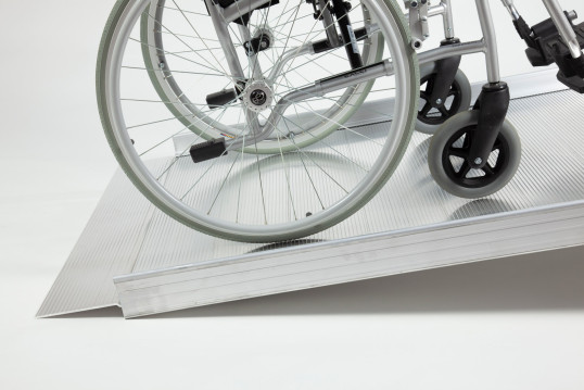 Wheelchair on wheelchair ramp