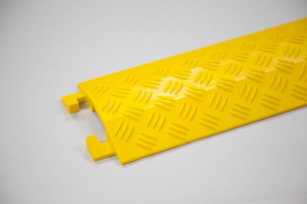Yellow floor cable cover