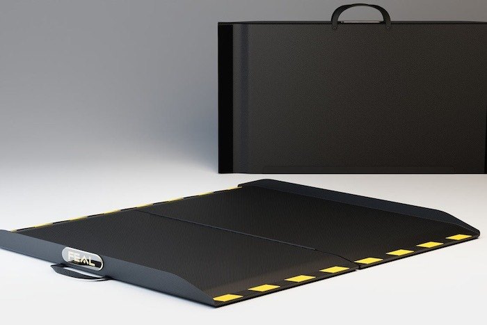 Carbon fibre wheelchair ramp folded 