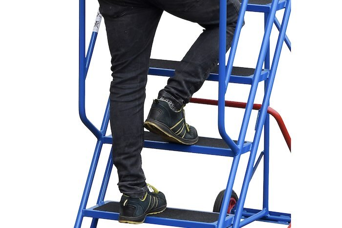 Ladder with anti-slip treads