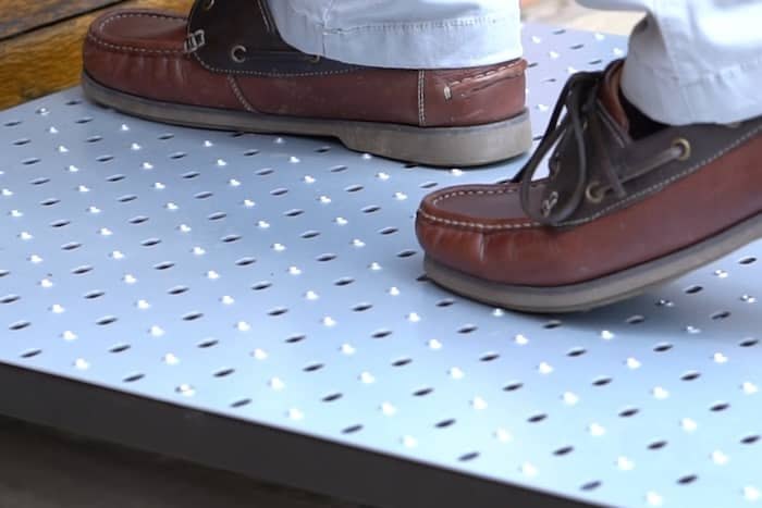 Half step with double handrails