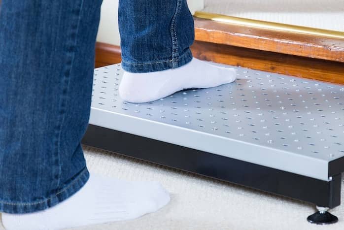 Half step with double handrails